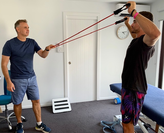 Jerry Cassell running a resistance band session at Physio You, Casuarina